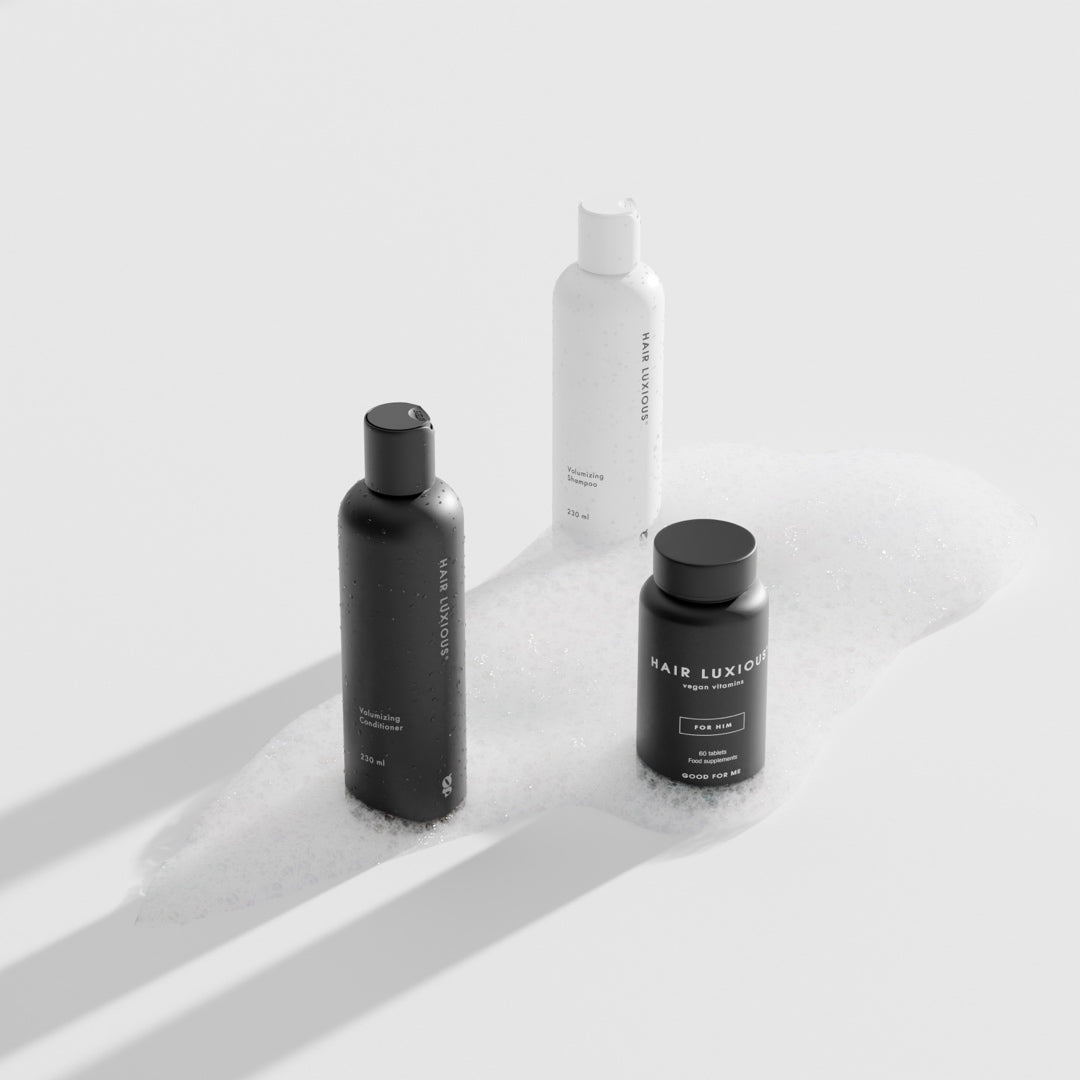 Hair Luxious Volumizing shampoo and conditioner beside the black For Him supplement jar