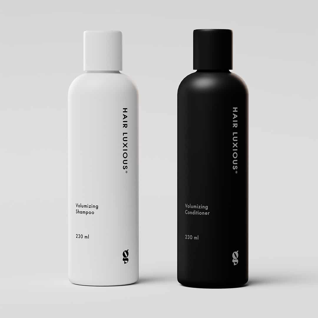 Hair Luxious Volumizing Set, shampoo and conditioner bottles side by side